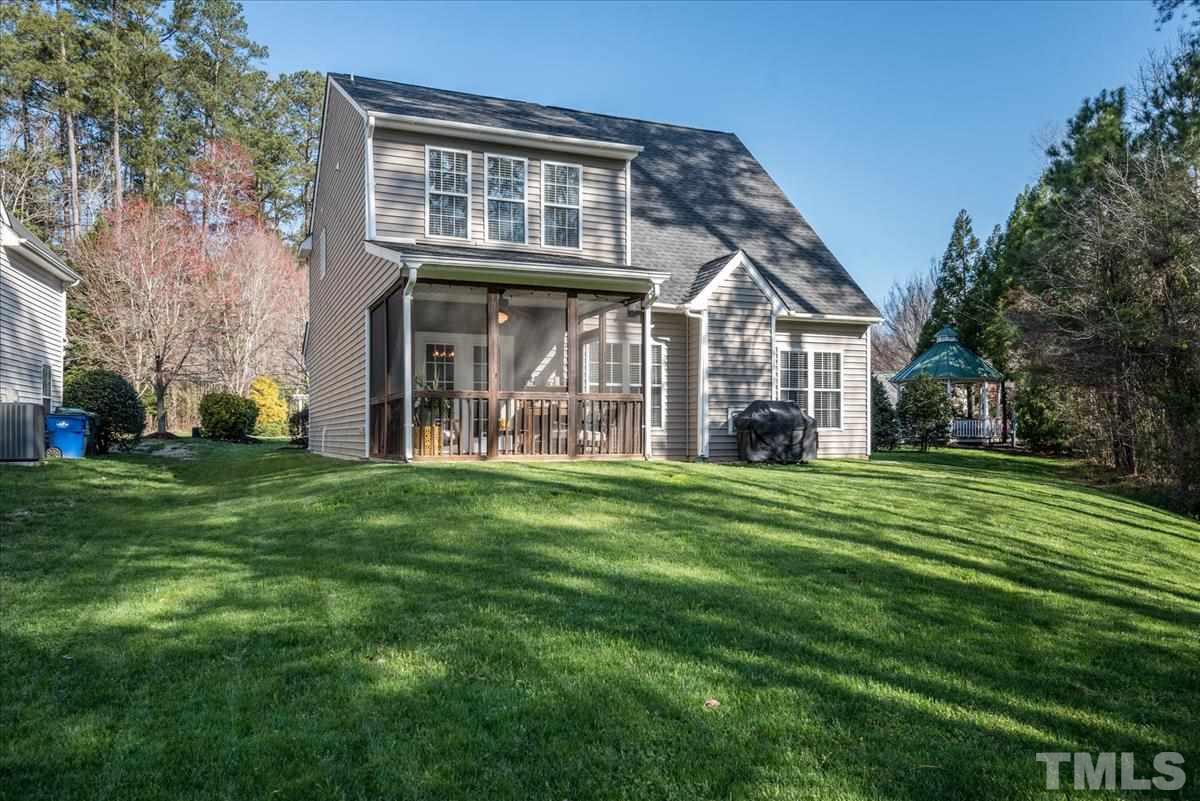 7724 Braefield Drive Raleigh, NC 27616 - Photo 26 of 27 a front view of a house with a garden