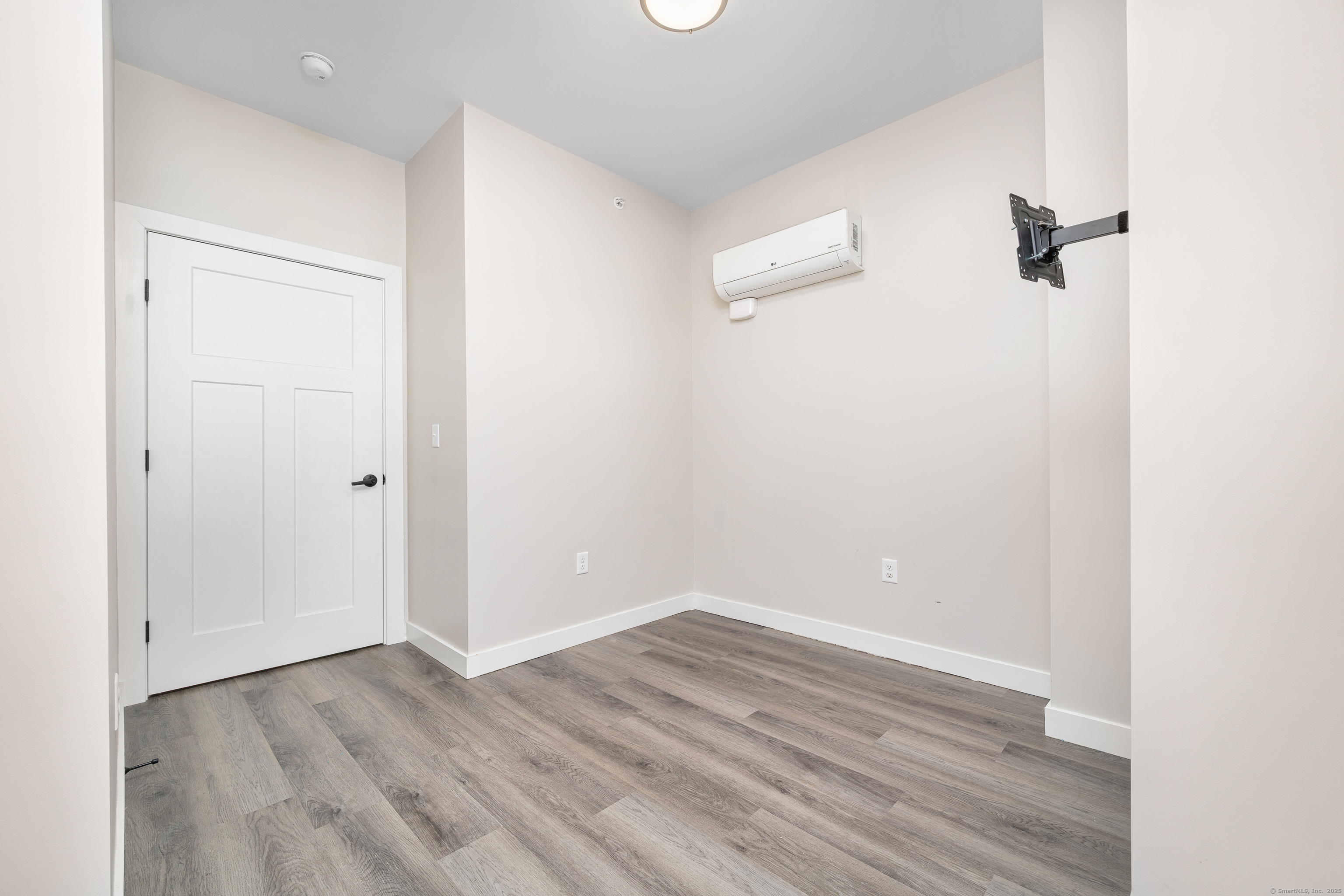 401 Albany Turnpike, Unit 201 Canton, CT 06019 - Photo 15 of 22 a view of a room with wooden floor