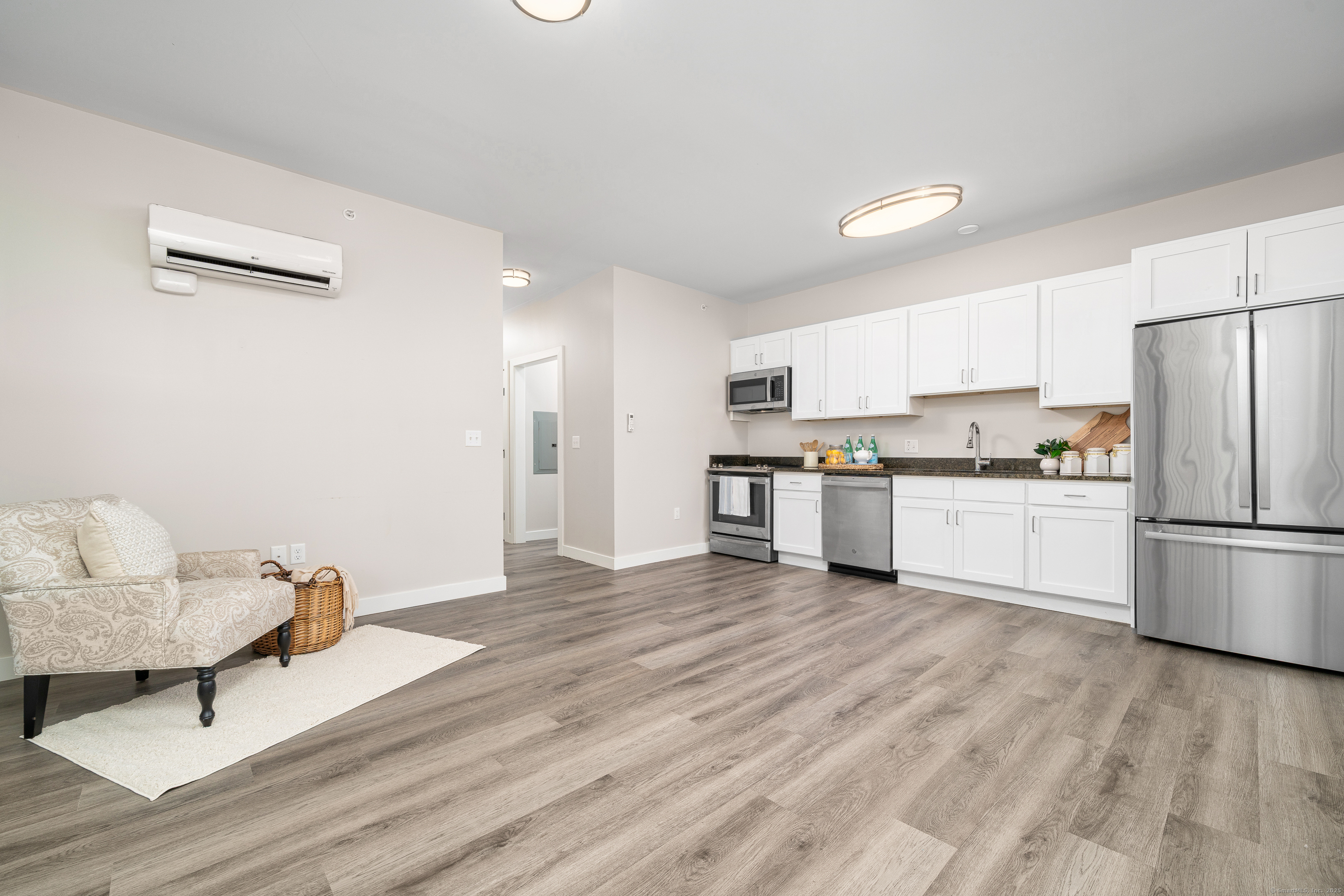 401 Albany Turnpike, Unit 201 Canton, CT 06019 - Photo 4 of 22 a kitchen with stainless steel appliances a refrigerator sink and cabinets