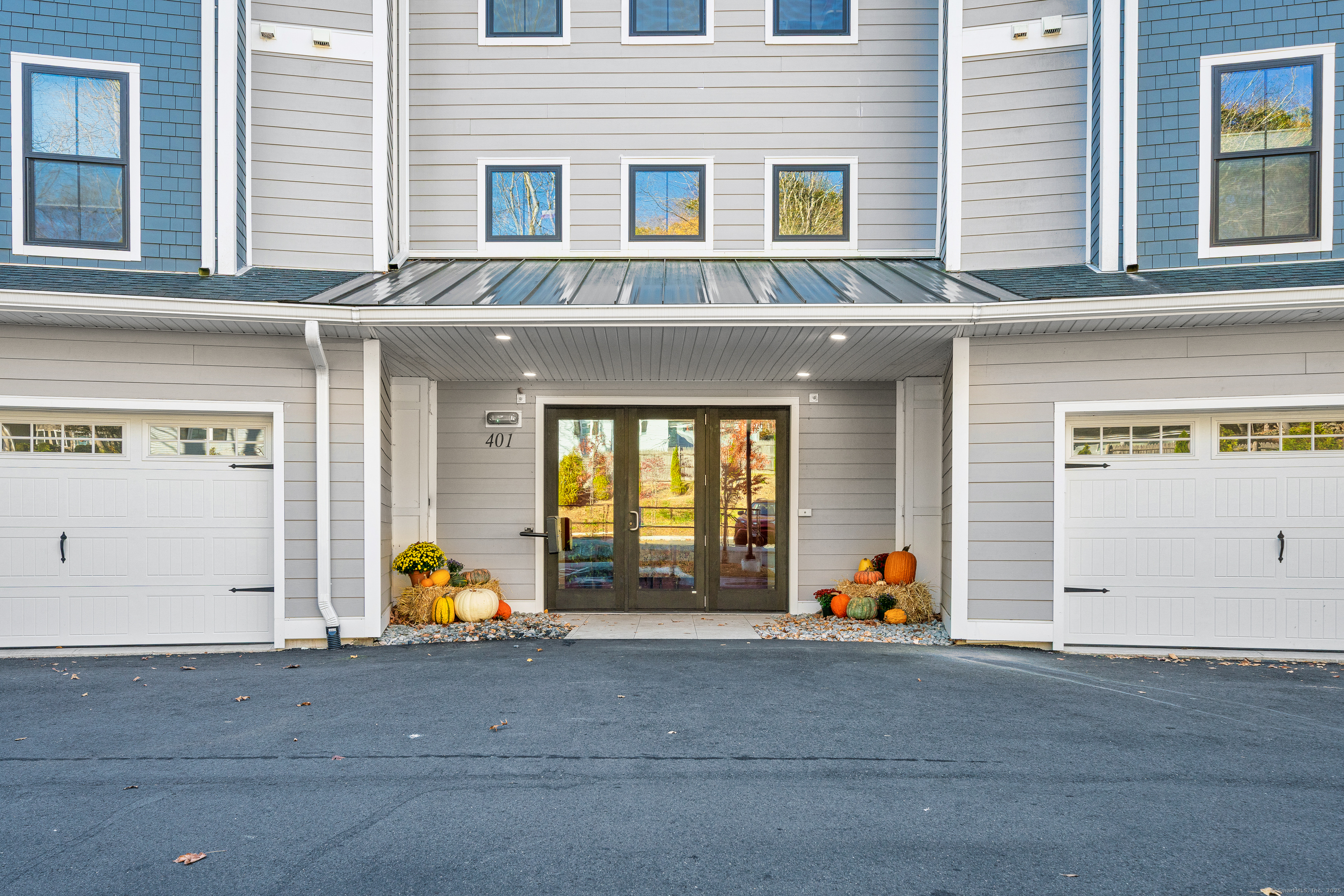401 Albany Turnpike, Unit 201 Canton, CT 06019 - Photo 10 of 22 a view of a building with outdoor space and windows