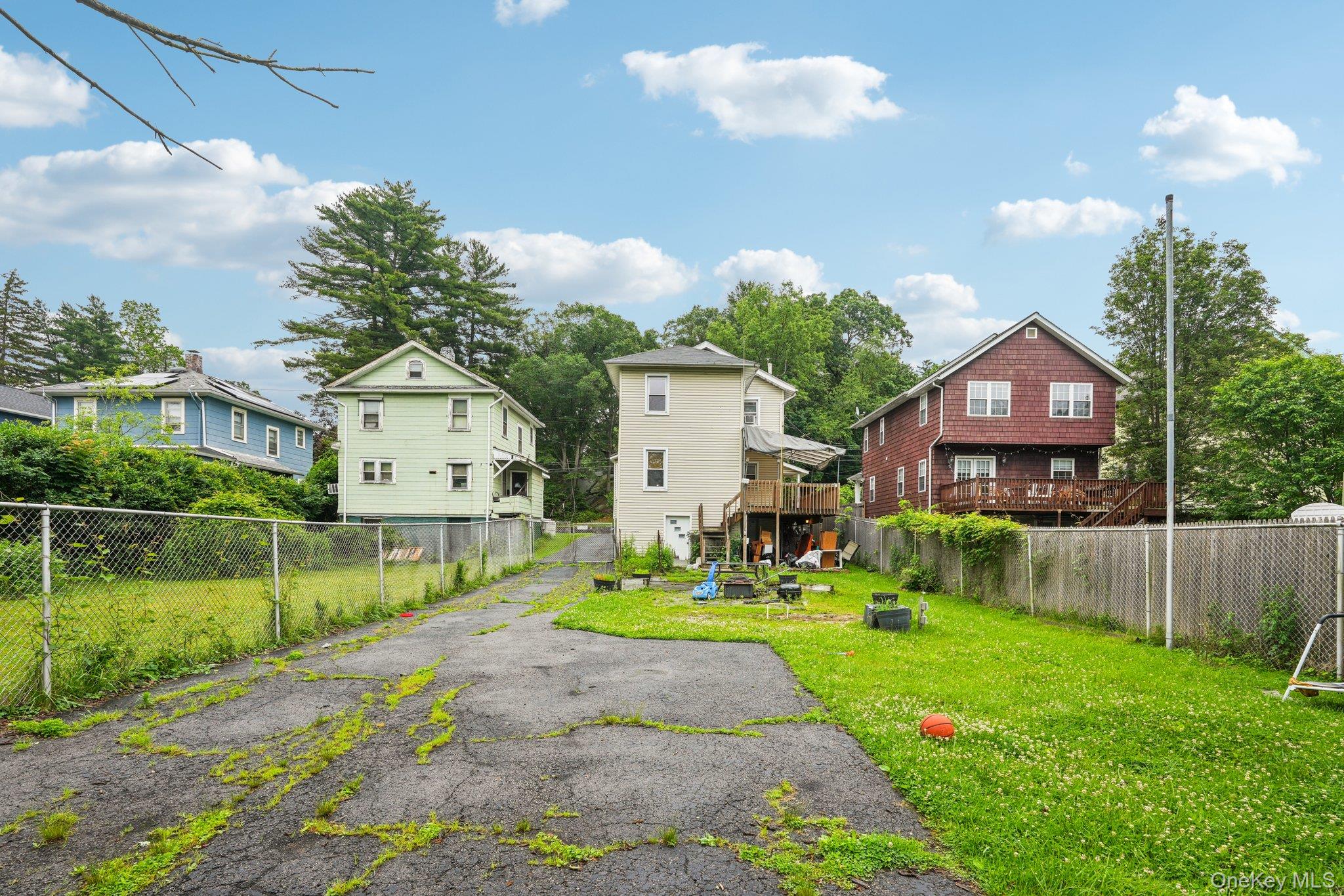 334 Union Avenue Peekskill, NY 10566 - Photo 17 of 20 Fenced-in backyard with ample driveway parking and yard space