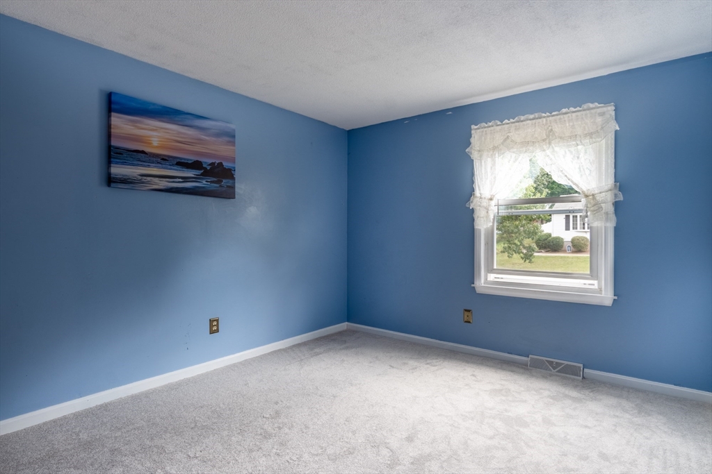 68 Sawmill Road Springfield, MA 01118 - Photo 11 of 25 an empty room with windows