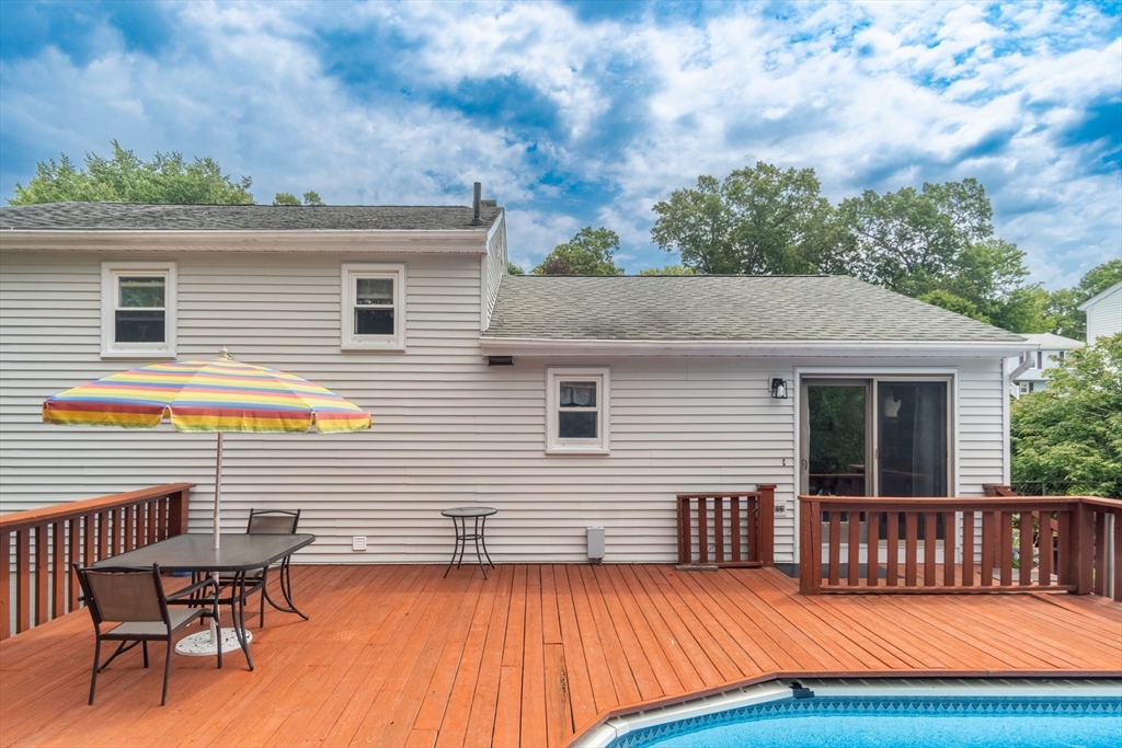 68 Sawmill Road Springfield, MA 01118 - Photo 19 of 25 a view of a house with wooden deck