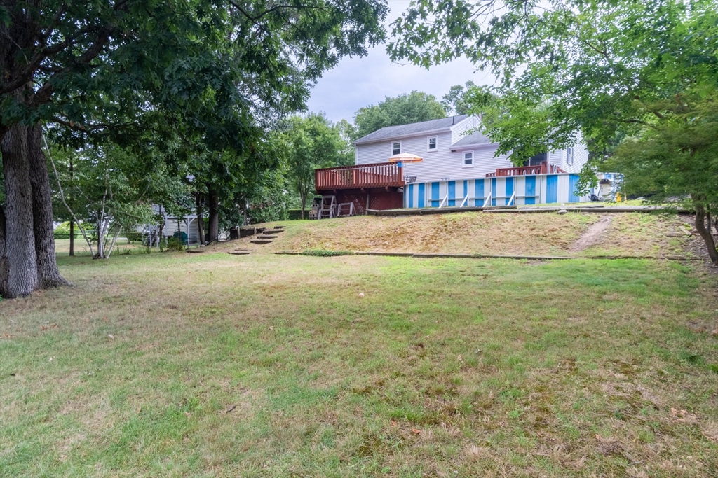 68 Sawmill Road Springfield, MA 01118 - Photo 20 of 25 a swimming pool with wooden fence