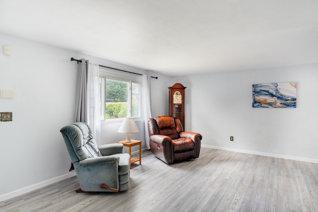 68 Sawmill Road Springfield, MA 01118 - Photo 4 of 25 a living room with furniture and a window
