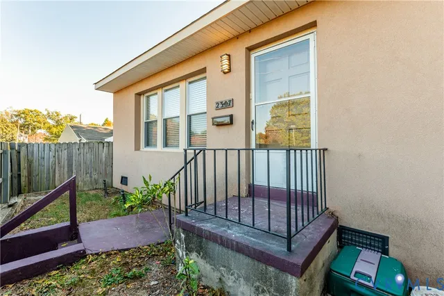 a view of a porch with a bench