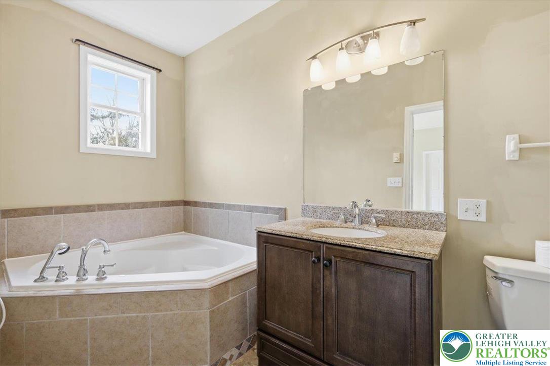 64 Robertson Road Jim Thorpe, PA 18229 - Photo 29 of 54 a bathroom with a sink and a mirror