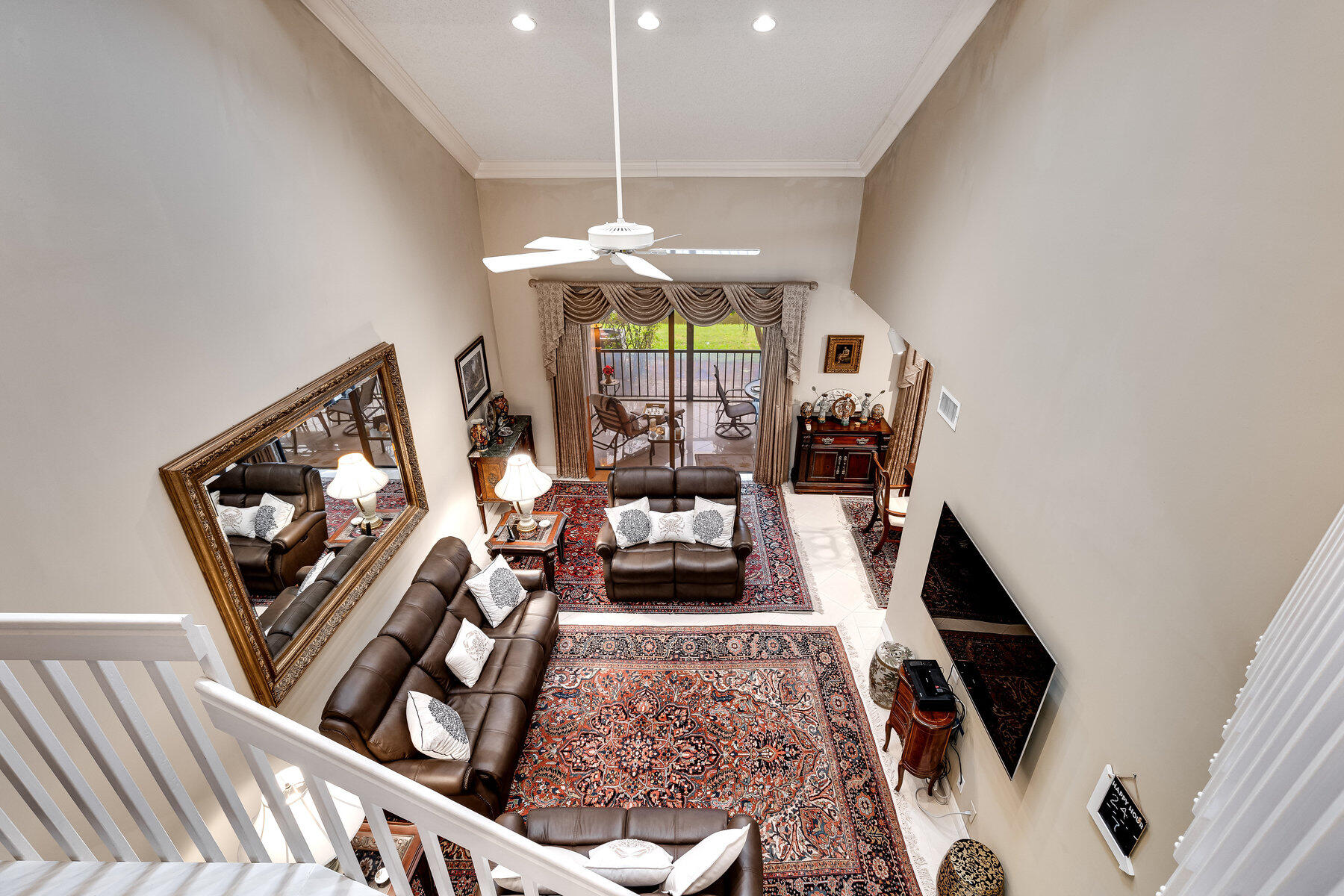 7771 La Mirada Drive Boca Raton, FL 33433 - Photo 17 of 38 a living room with furniture and a flat screen tv
