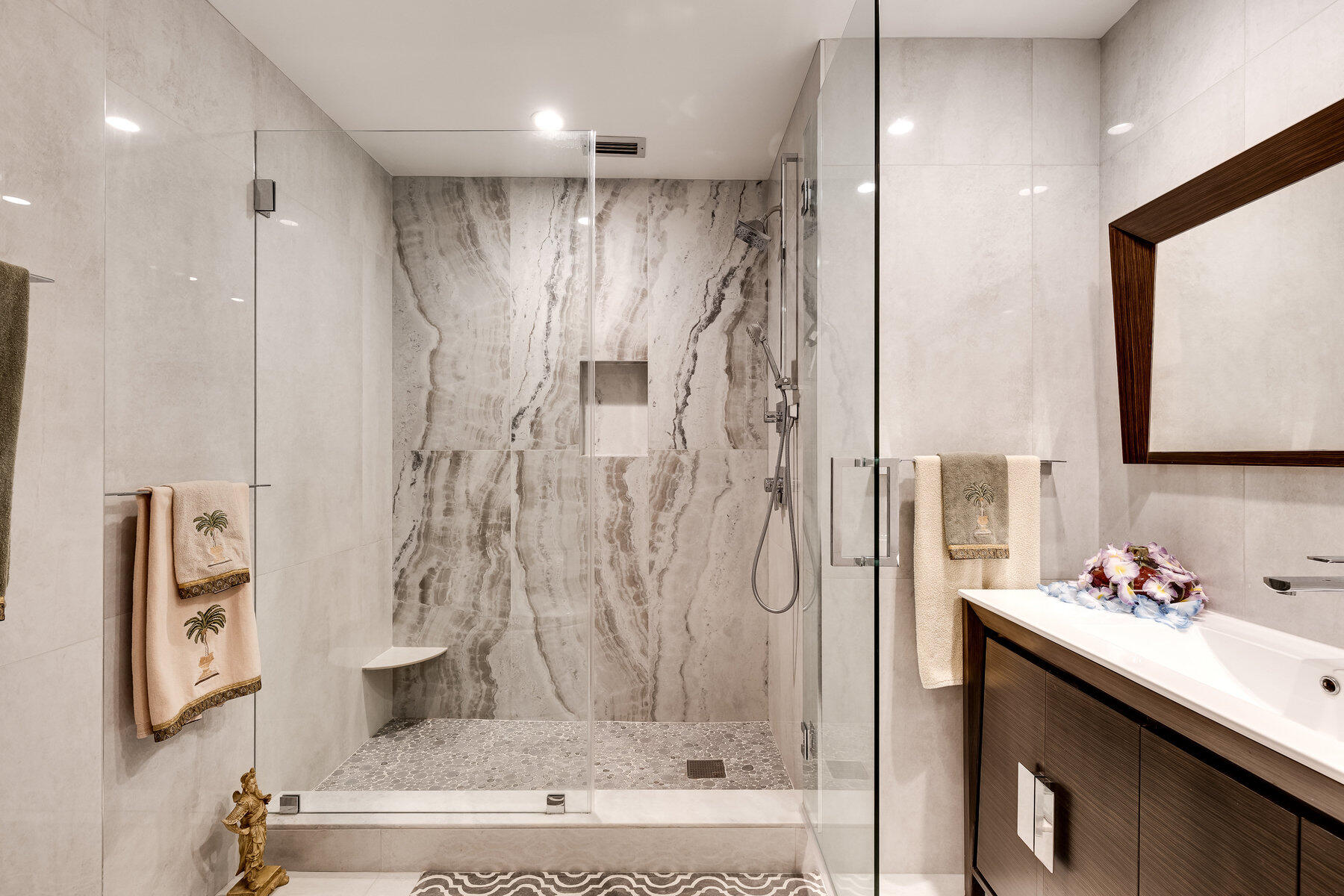 7771 La Mirada Drive Boca Raton, FL 33433 - Photo 24 of 38 a bathroom with a shower sink and mirror