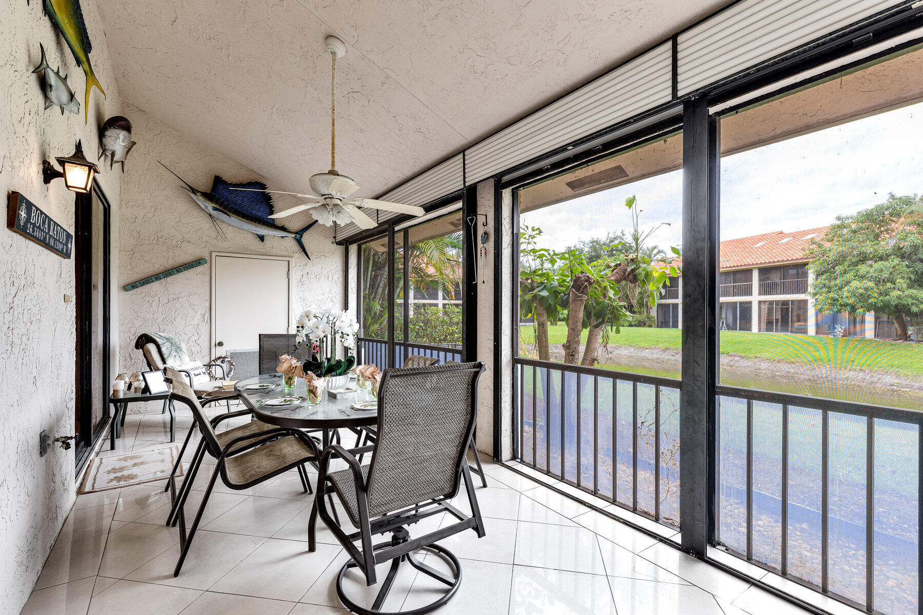 7771 La Mirada Drive Boca Raton, FL 33433 - Photo 31 of 38 a view of a dining room with furniture window and outside view