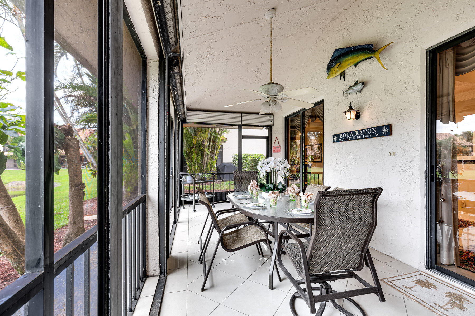7771 La Mirada Drive Boca Raton, FL 33433 - Photo 32 of 38 a view of a dining room with furniture window and outside view