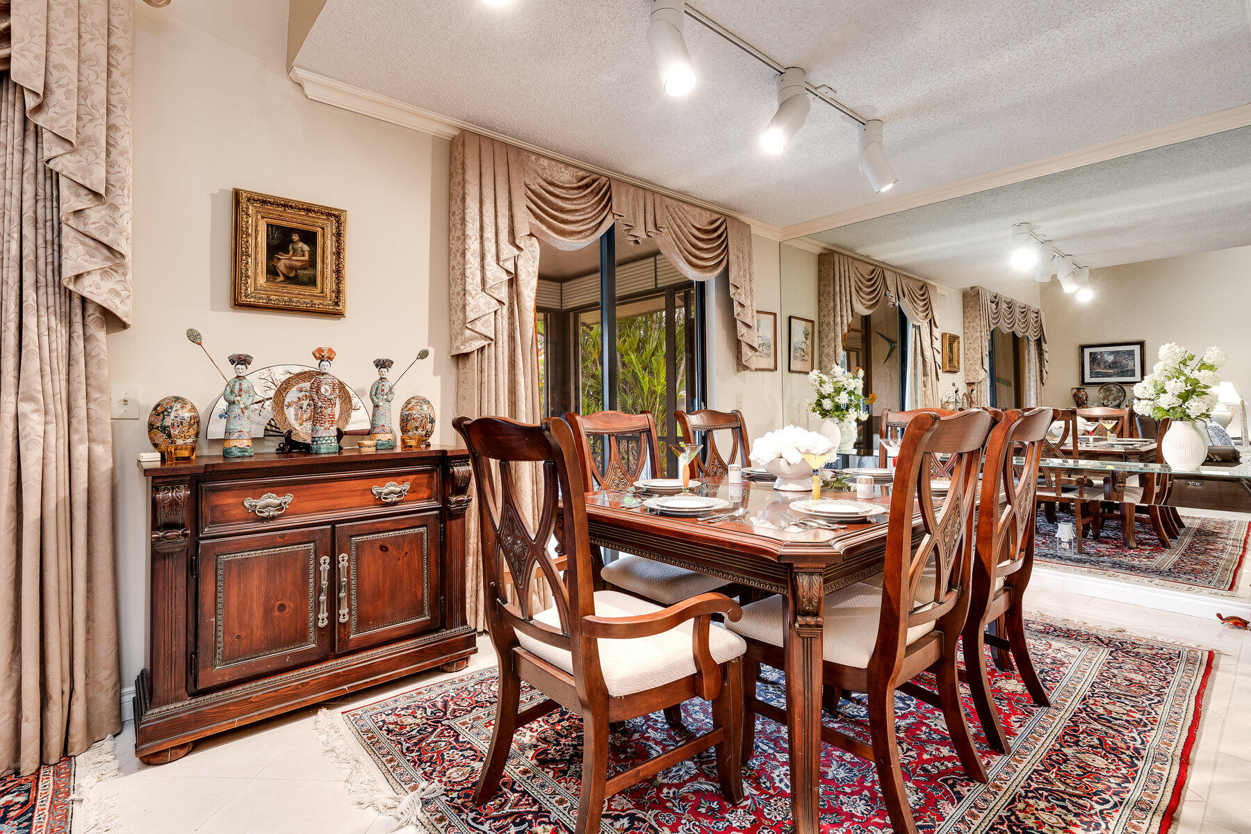 7771 La Mirada Drive Boca Raton, FL 33433 - Photo 9 of 38 a view of a dining room with furniture