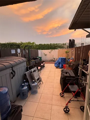 a view of a terrace with furniture