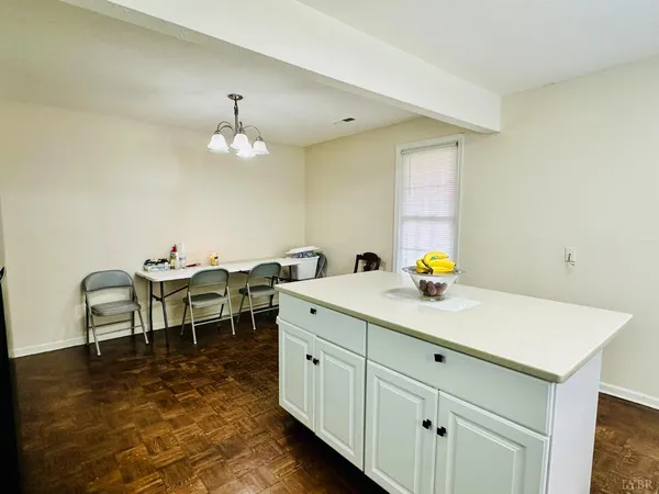a spacious bathroom with a double vanity sink and a mirror