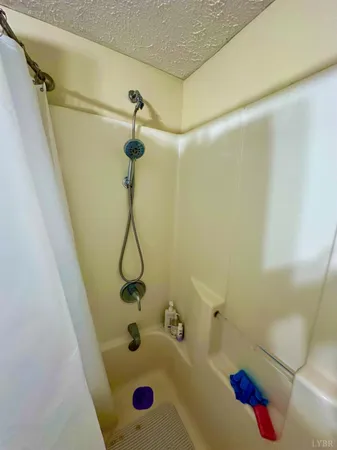 a bathroom with a sink and a shower
