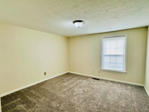an empty room with a workbench