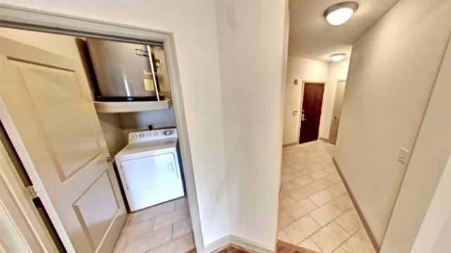 a bathroom with a sink a mirror a vanity and a bathtub