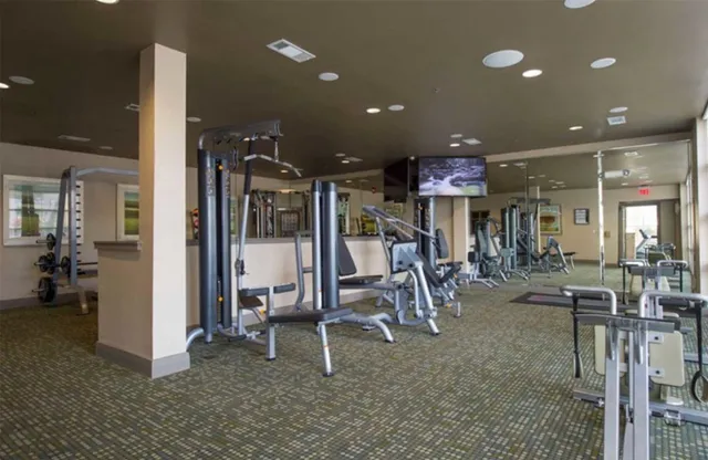 a outdoor space with tables and chairs