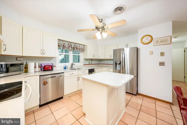 a bed room with a bed and a television