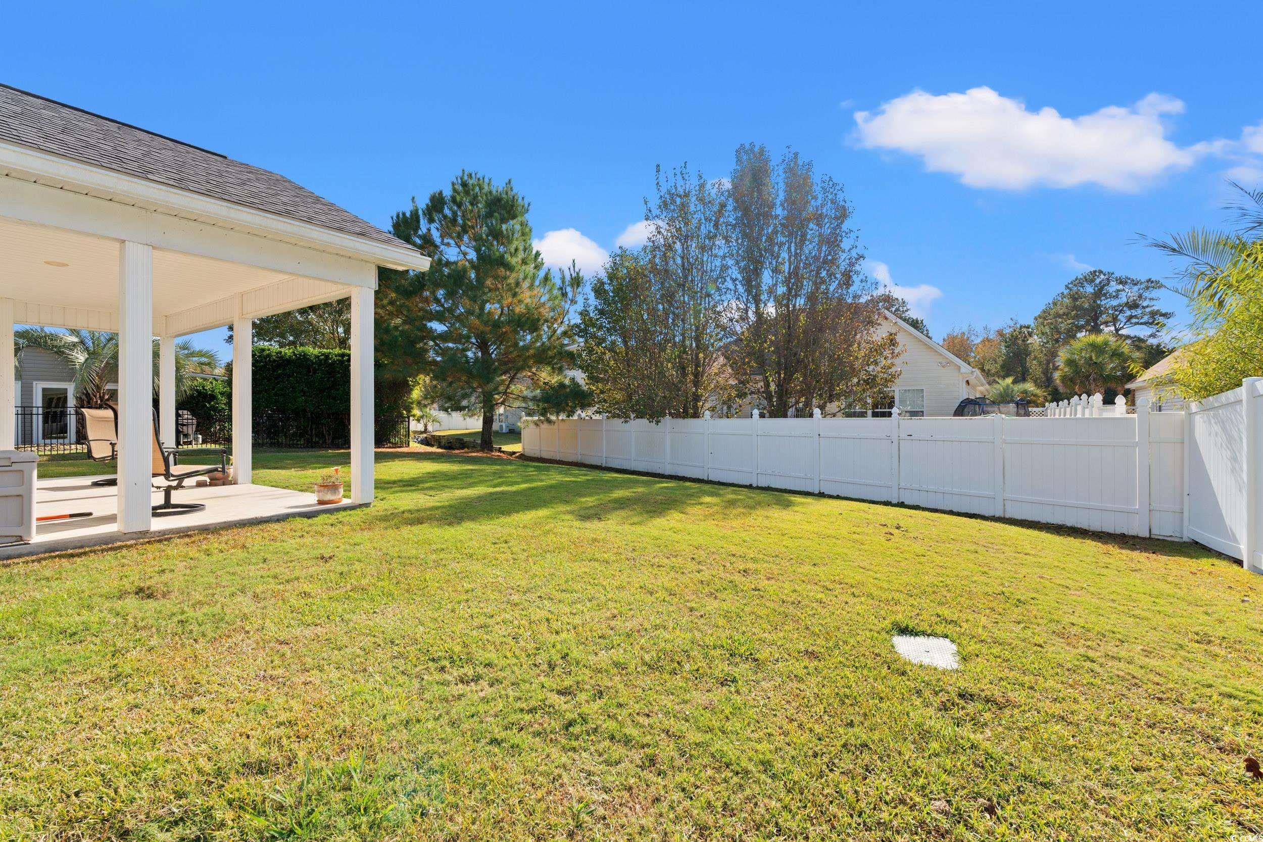 132 Fox Den Drive Murrells Inlet, SC 29576 - Photo 21 of 35 View of yard with a patio area