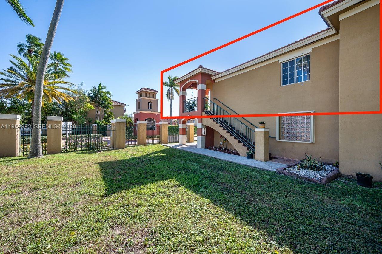 15250 Southwest 134th Place, Unit 102 Miami, FL 33177 - Photo 23 of 23 a view of backyard of the house