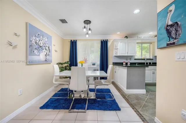 a view of a dining room with furniture