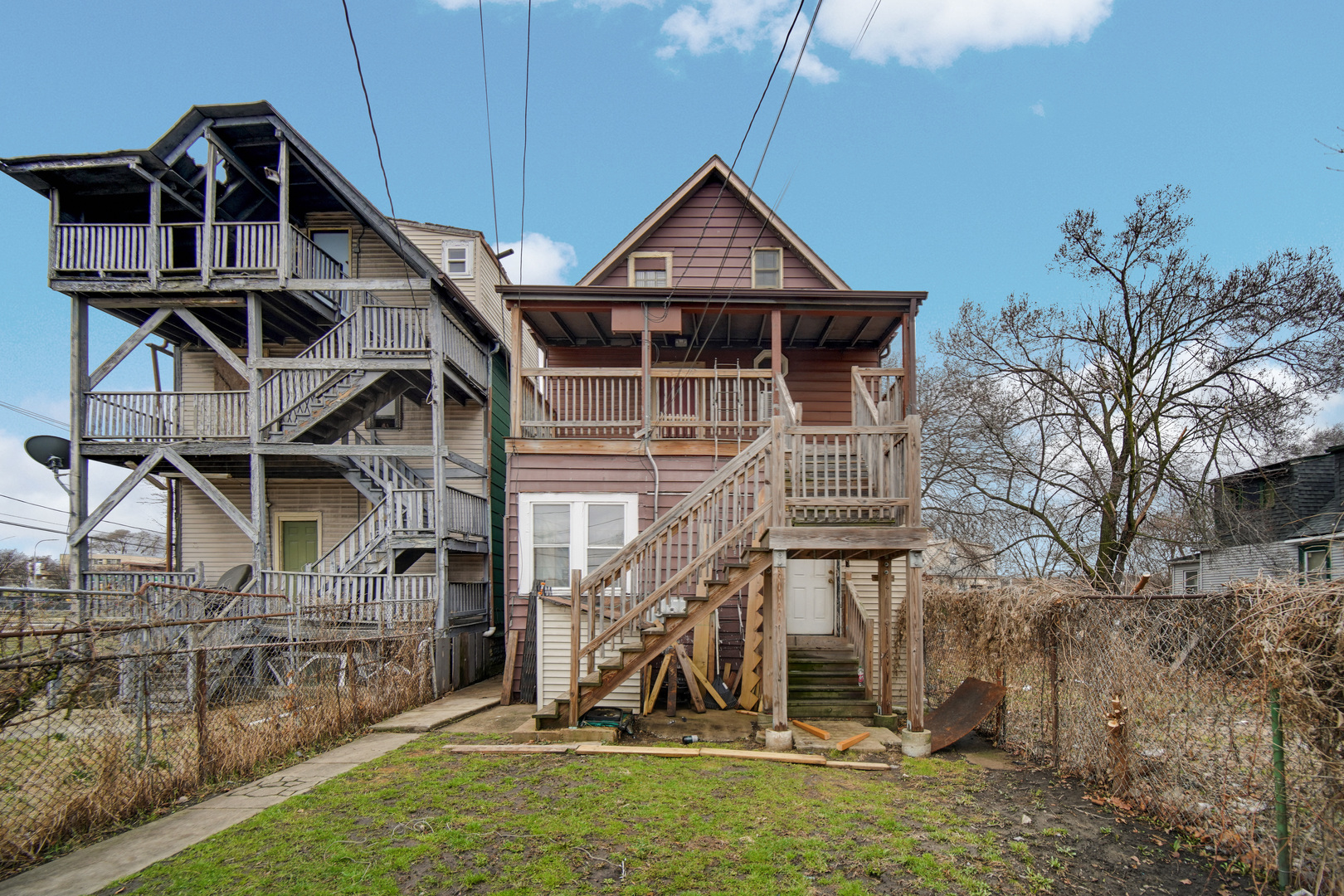 6237 South May Street Chicago, IL 60621 - Photo 14 of 14 a front view of a house with a yard