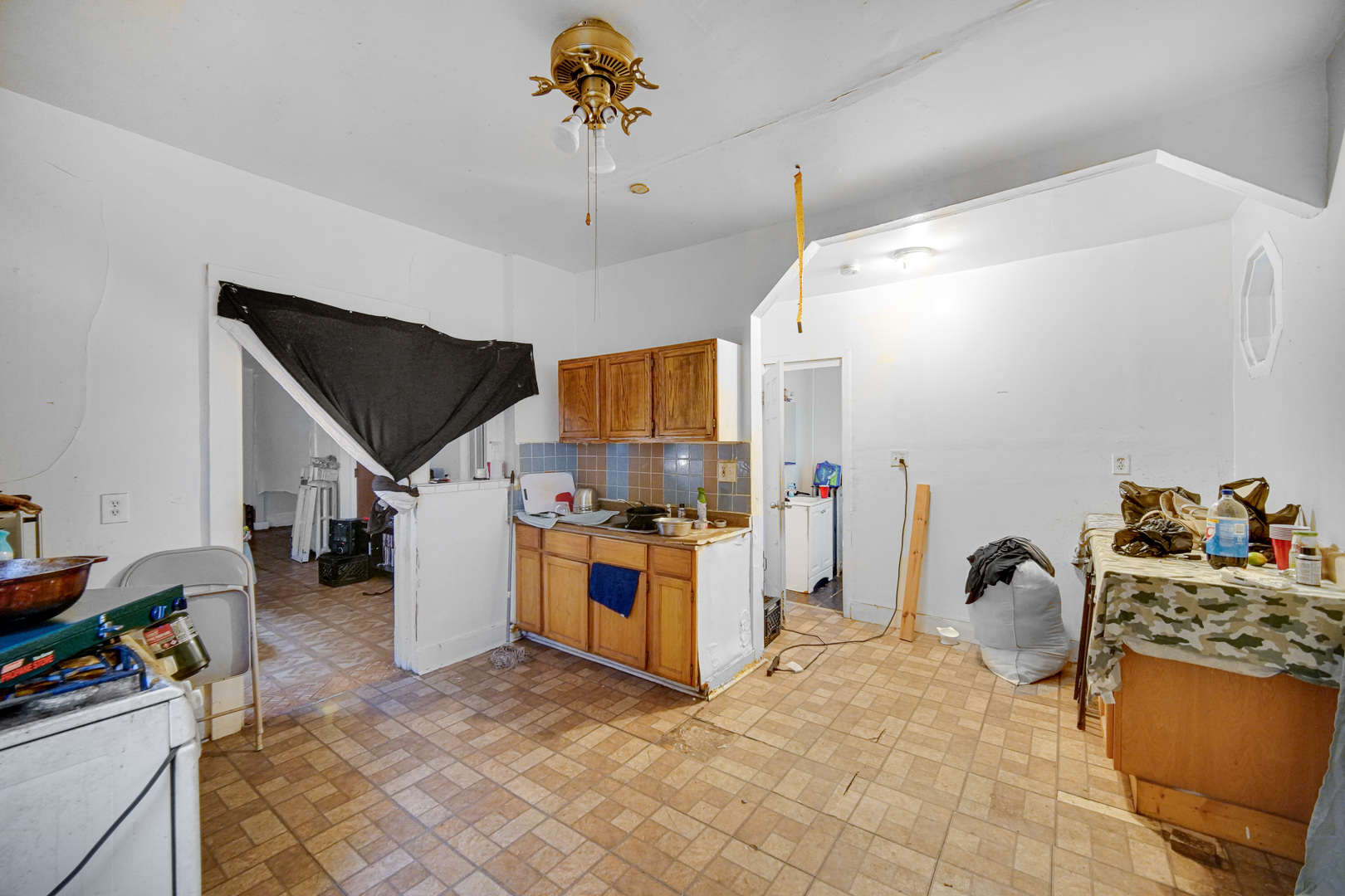 6237 South May Street Chicago, IL 60621 - Photo 9 of 14 a living room with furniture and a flat screen tv