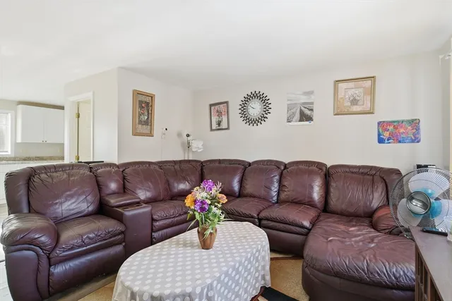 a living room with a couch and a couch