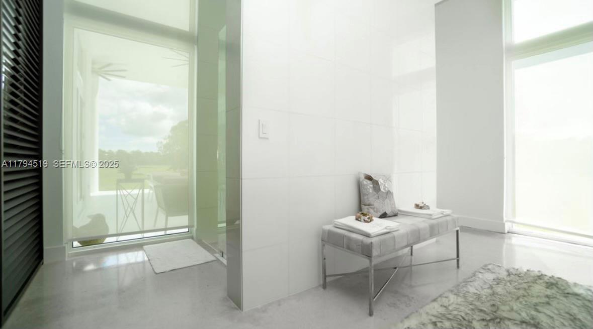 1901 Southeast Ranch Road South Jupiter, FL 33478 - Photo 23 of 53 a bathroom with a window