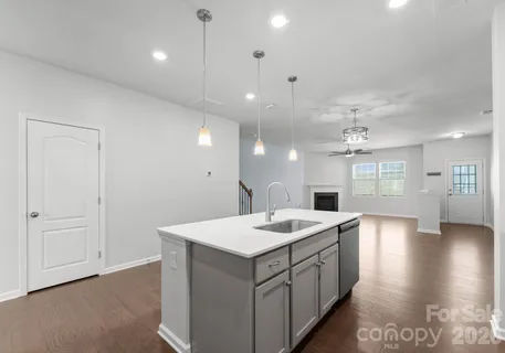 a bathroom with a sink a vanity and mirror