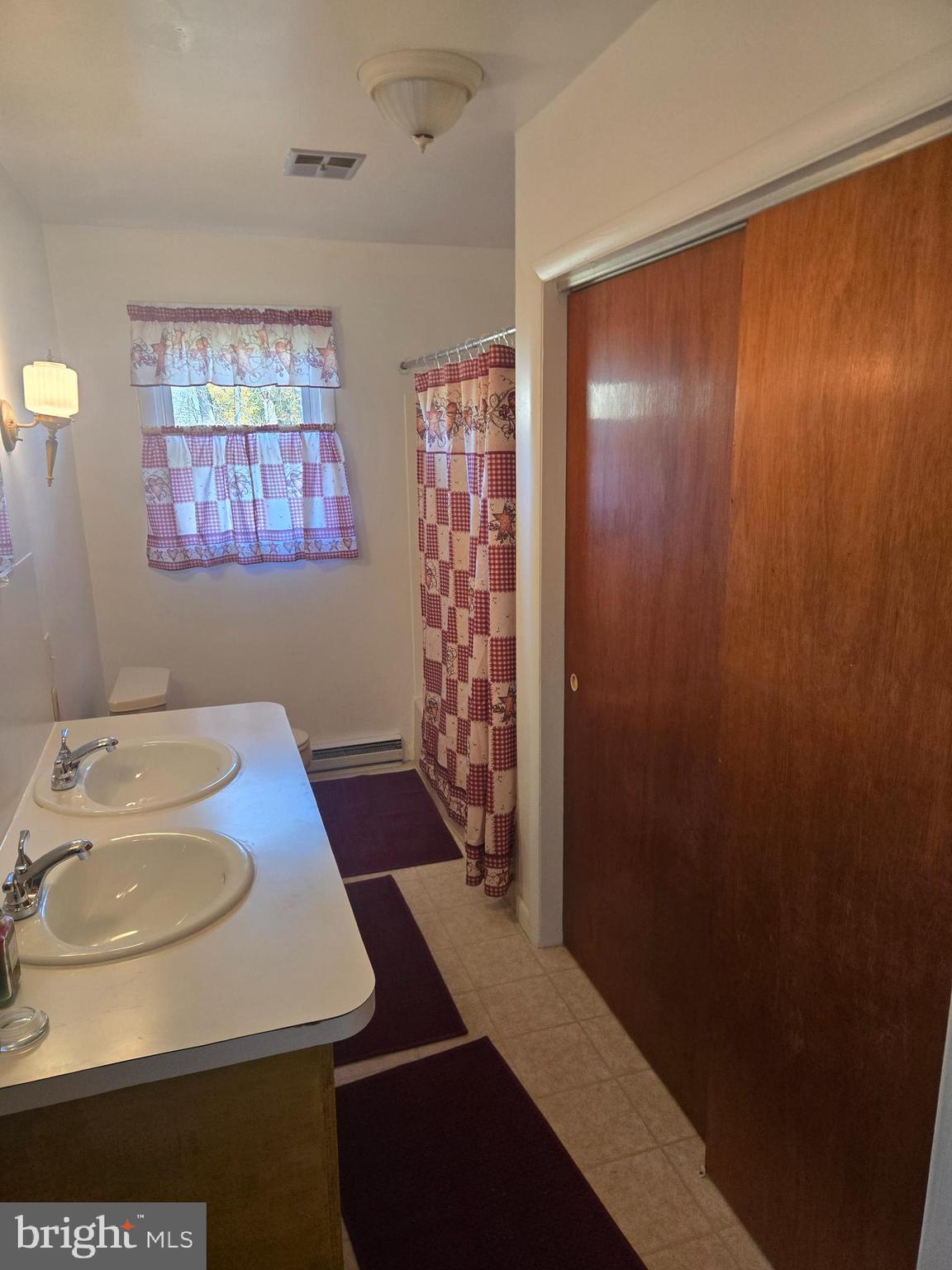 1903 Glen Cove Road Darlington, MD 21034 - Photo 15 of 21 a bathroom with a sink and a mirror