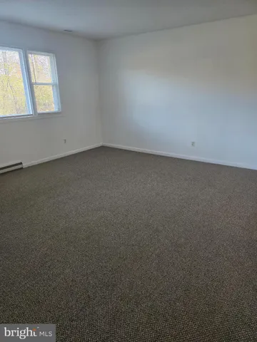 a kitchen with stainless steel appliances a sink and cabinets