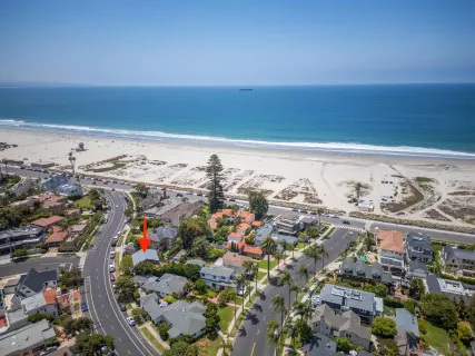 an aerial view of beach and ocean