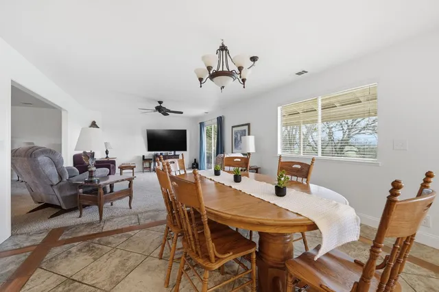 a bed room with furniture and a fireplace