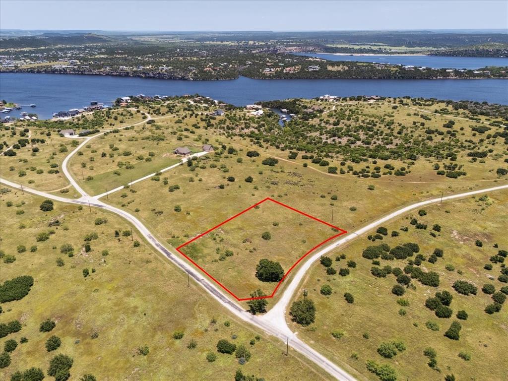 Lot 75 Lake Shore Loop Graford, TX 76449 - Photo 6 of 21 Aerial View of Lot and Lake Featuring Property Parcel Outlined