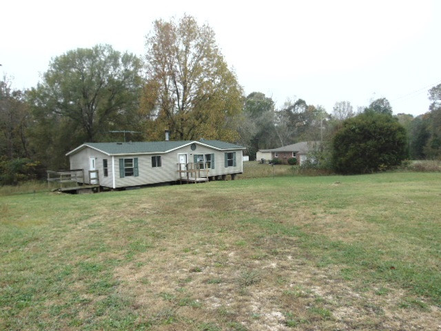 661 Bowman Road Medon, TN 38356 - Photo 1 of 1 a house view with a garden space