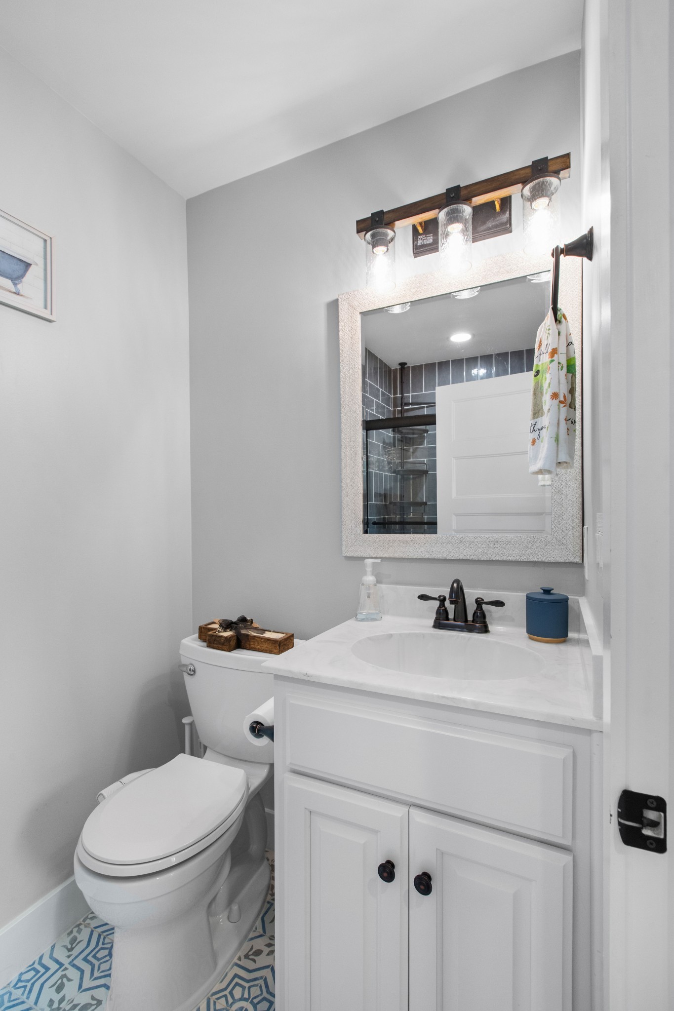 294 McDale Road Shelbyville, TN 37160 - Photo 19 of 47 a bathroom with a sink toilet and mirror