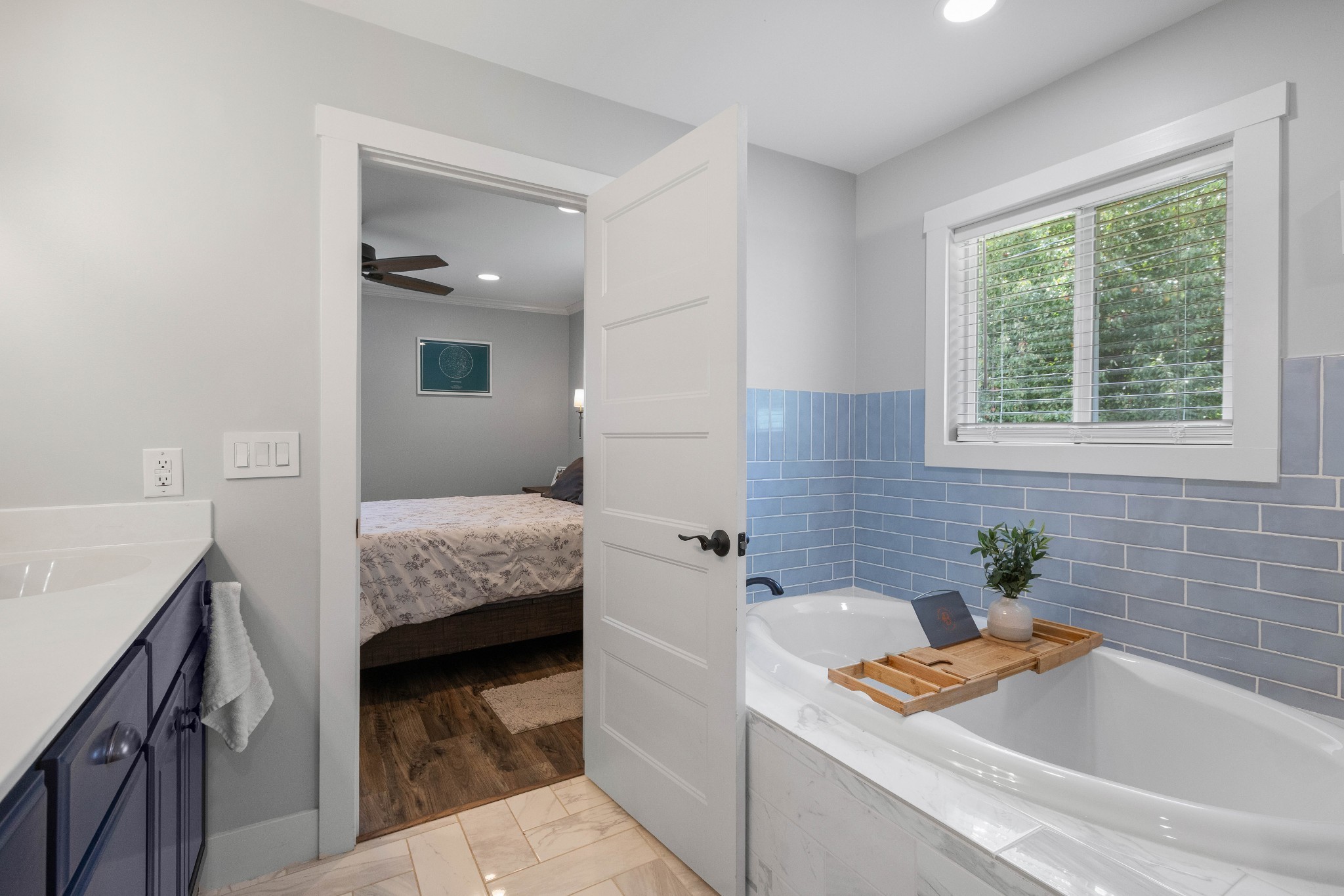 294 McDale Road Shelbyville, TN 37160 - Photo 27 of 47 a bathroom with a tub sink and mirror