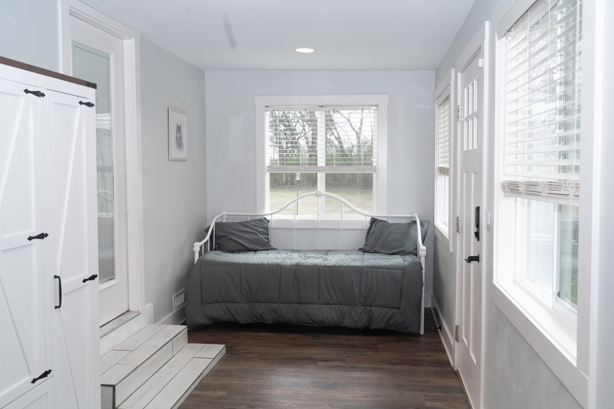 294 McDale Road Shelbyville, TN 37160 - Photo 36 of 47 a bedroom with a bed and a window with wooden floor