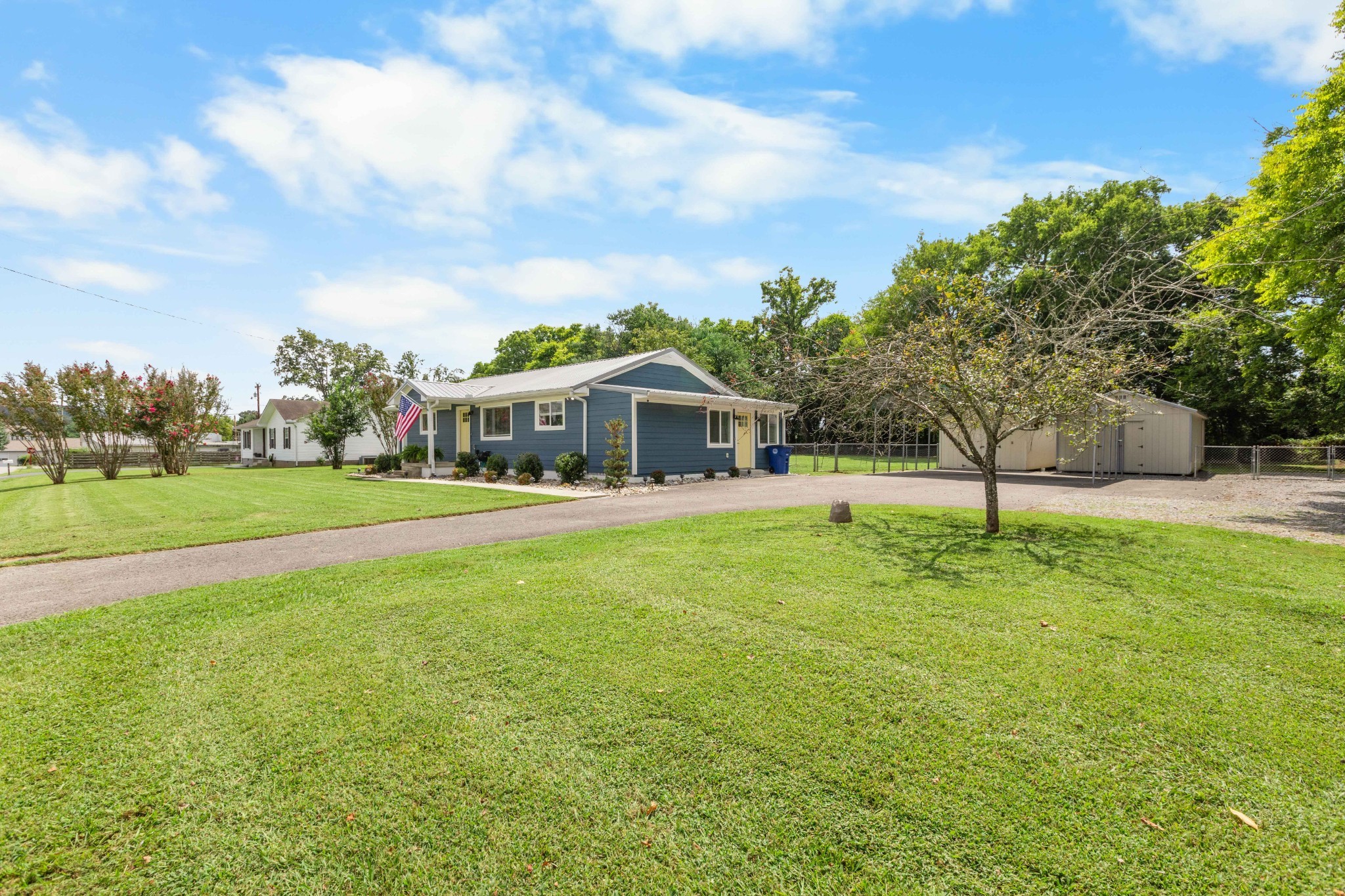 294 McDale Road Shelbyville, TN 37160 - Photo 37 of 47 a view of house with a garden