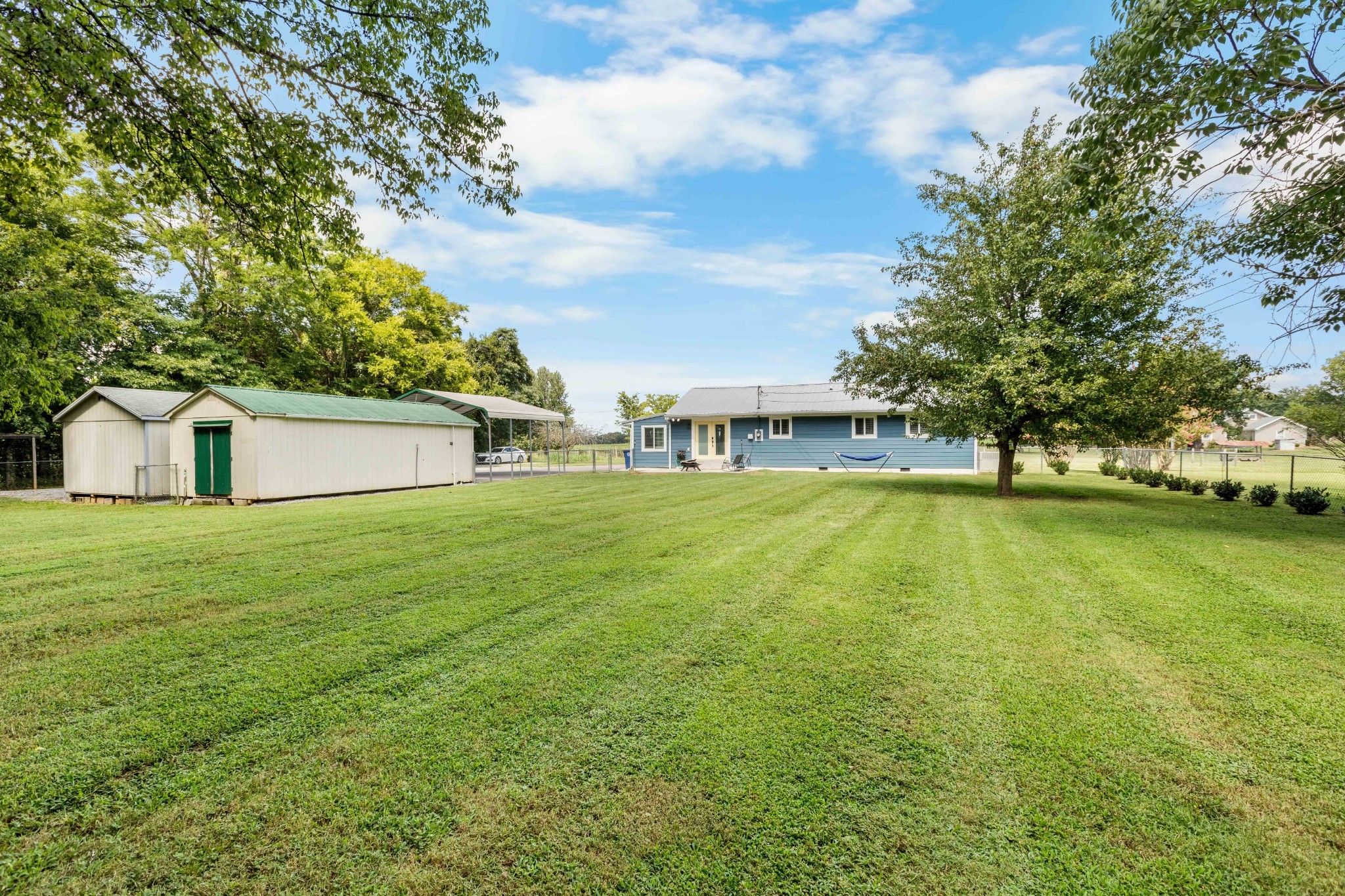294 McDale Road Shelbyville, TN 37160 - Photo 45 of 47 a house view with swimming pool in front of it
