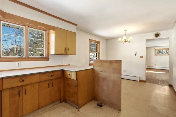 a view of a kitchen with a sink