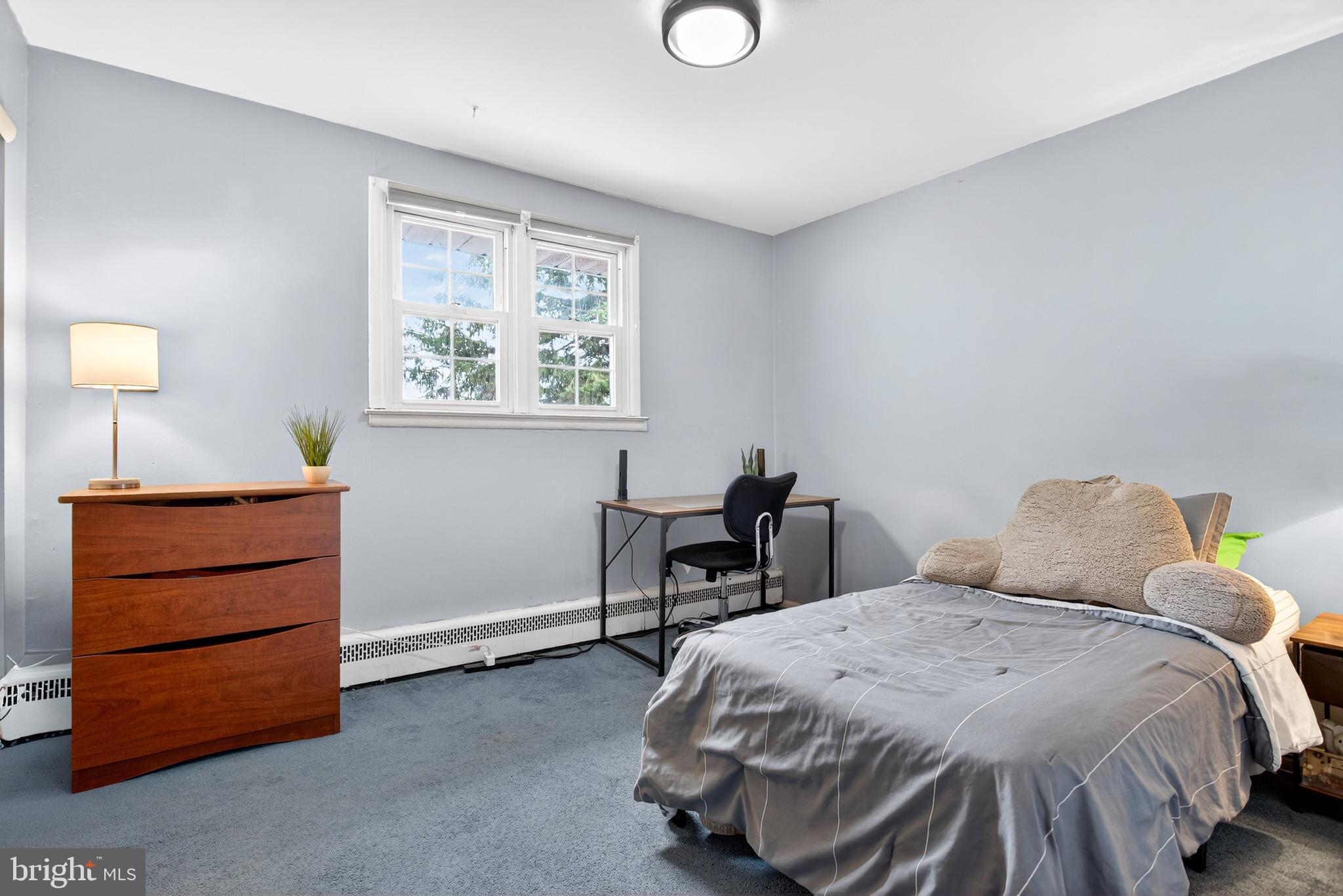 26 Austin Road Yardley, PA 19067 - Photo 18 of 33 a bedroom with a bed and a window