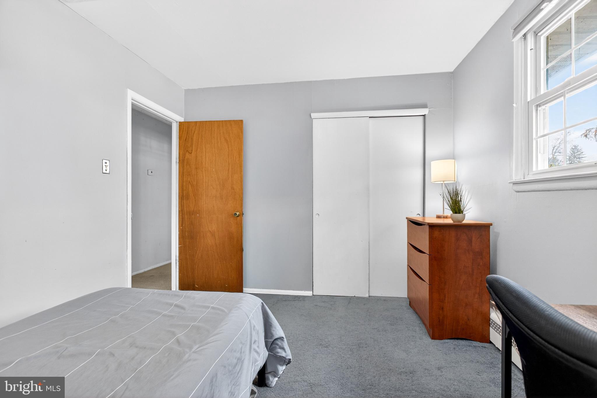 26 Austin Road Yardley, PA 19067 - Photo 19 of 33 a bedroom with a bed and a dresser