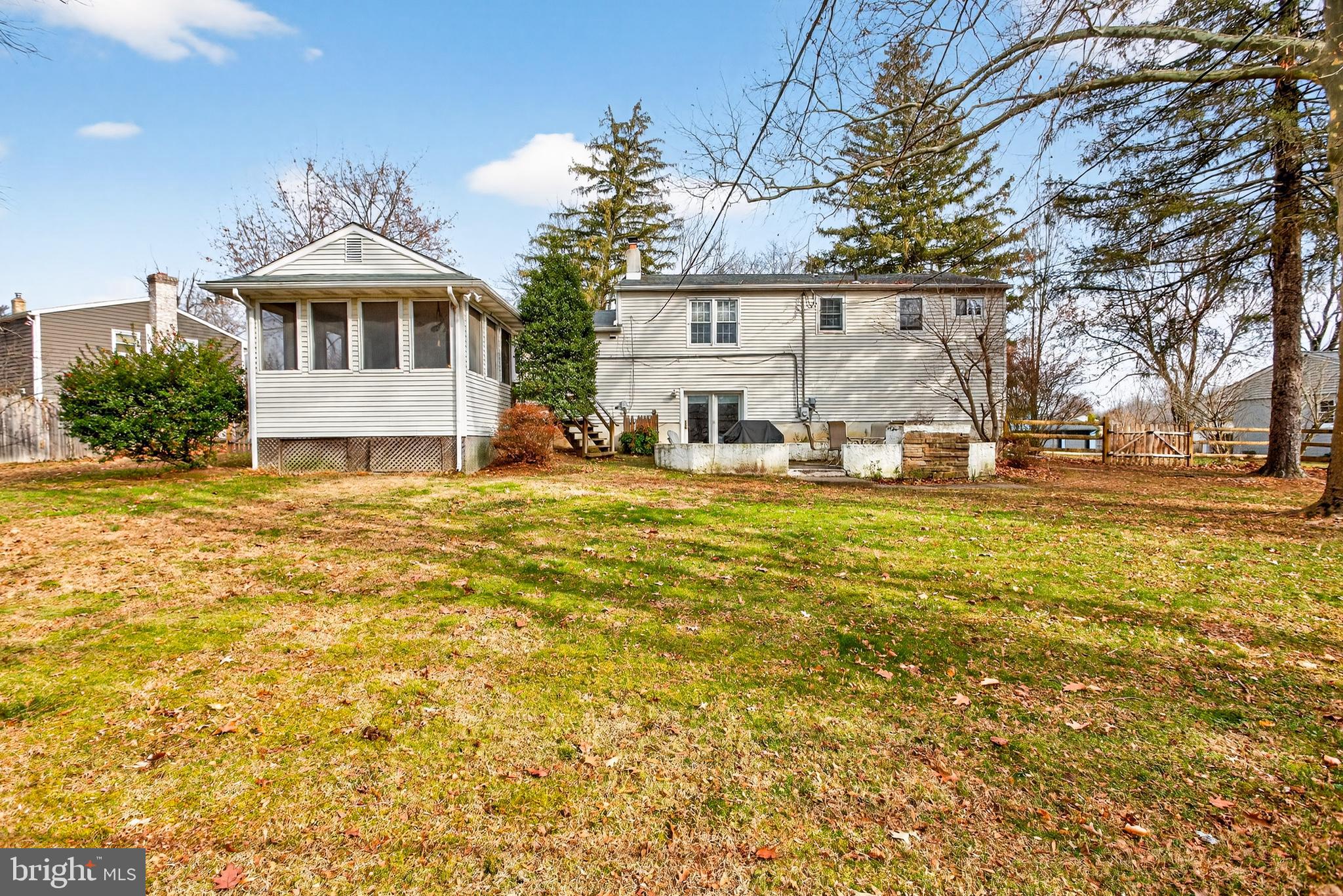 26 Austin Road Yardley, PA 19067 - Photo 27 of 33 a front view of house with yard and trees around