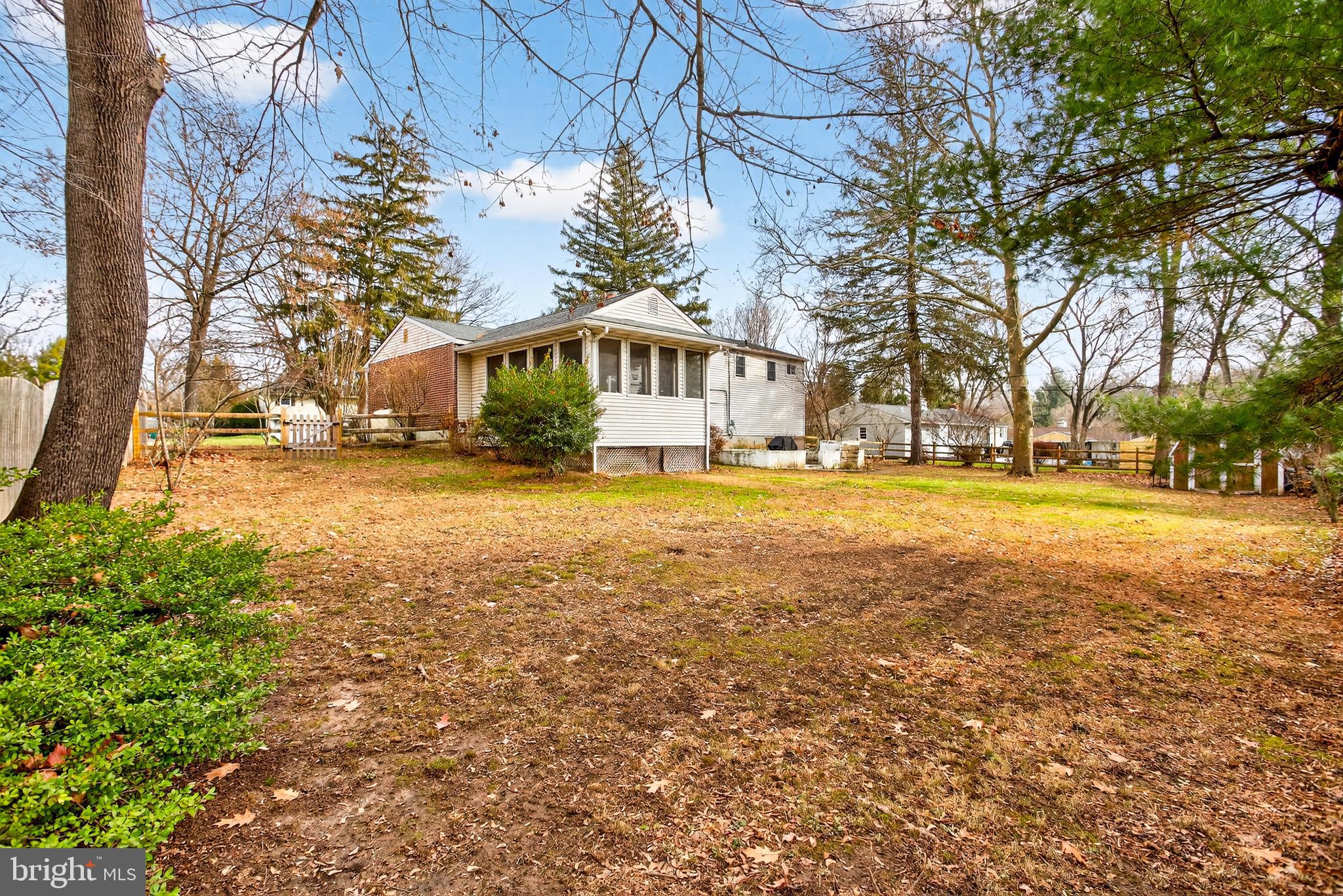 26 Austin Road Yardley, PA 19067 - Photo 30 of 33 a view of a yard with a house in the background