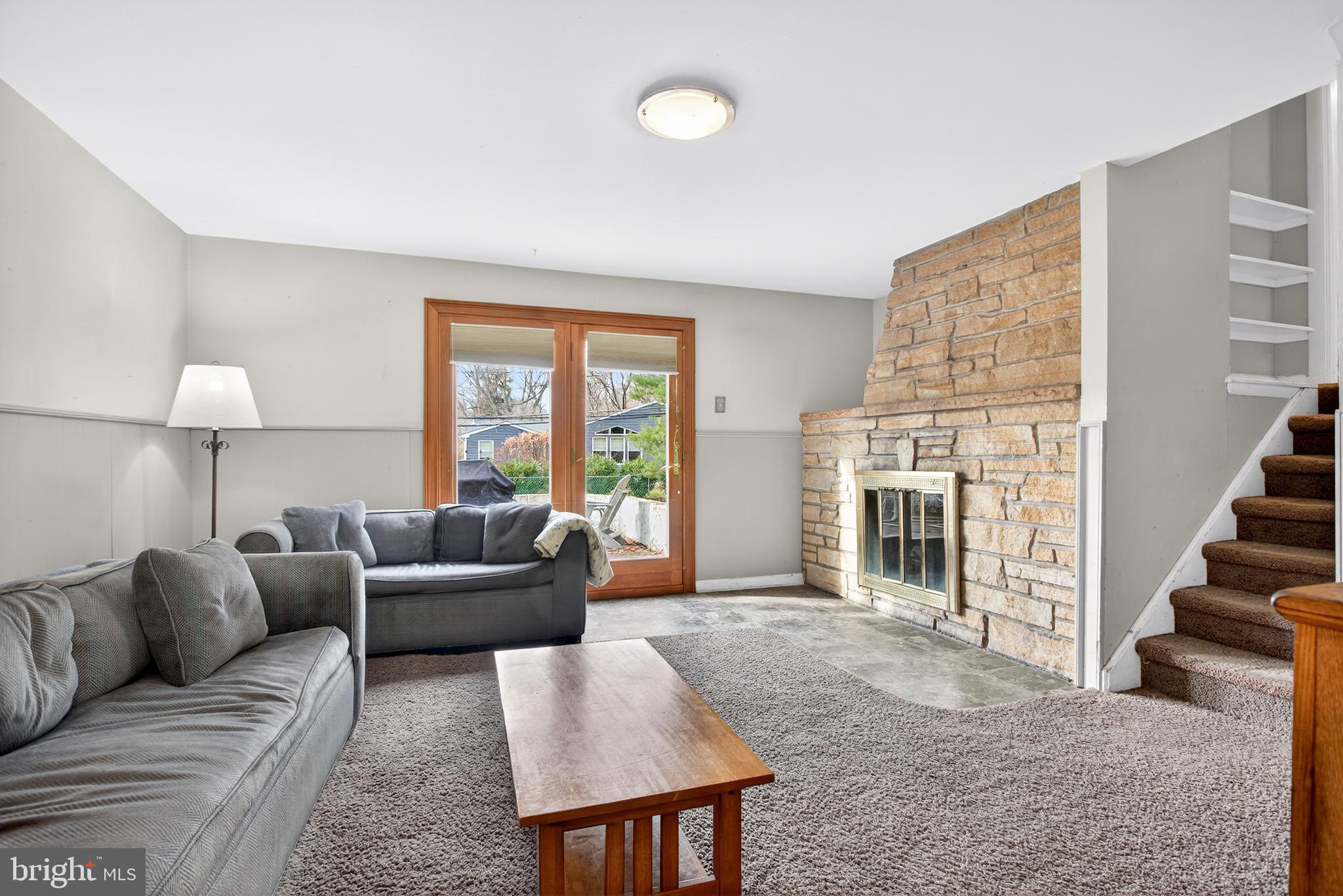 26 Austin Road Yardley, PA 19067 - Photo 10 of 33 a living room with furniture and a fireplace