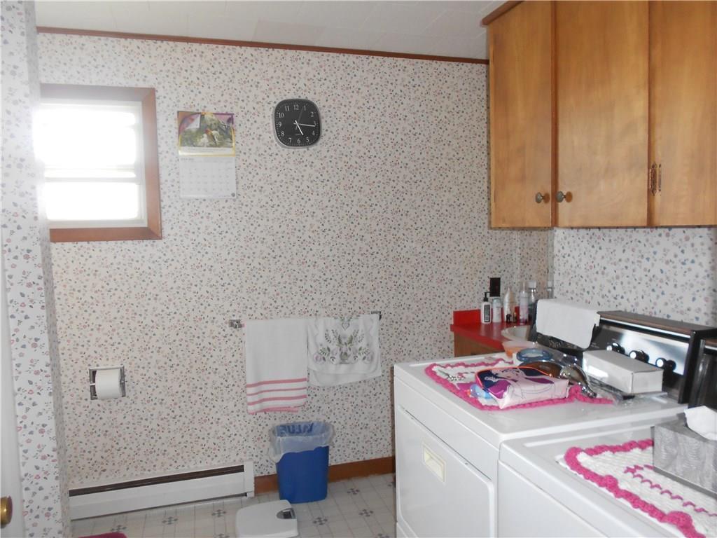 135 Maple Grove Road Fort Fairfield, ME 04742 - Photo 5 of 11 Bathroom with laundry