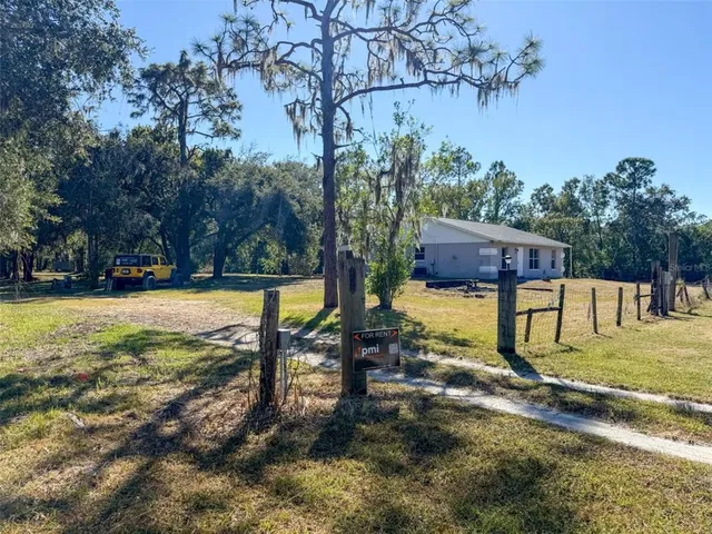 a view of swimming pool with a patio